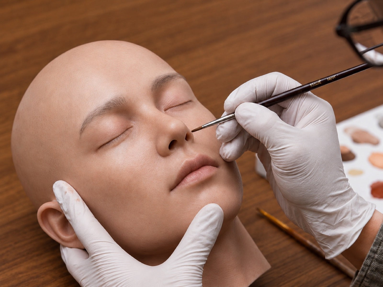 Hand-painting skin tones on the ROLA face